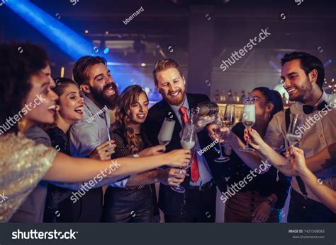 Group Friends Celebrating Champagne Nightclub Stock Photo