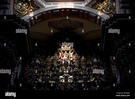 Sun light illuminates a sculpture of Apostle Simon Peter in the main