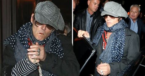 Johnny Depp Coolly Smokes A Cigarette On Rolling Stones Night Out Metro News