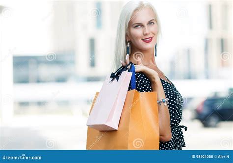 Image Of Woman With Purchases Stock Photo Image Of Outside Happy