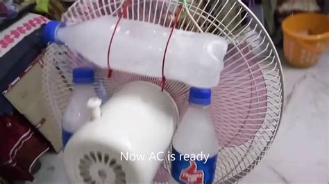 Modify the bottles by cutting off the end and punching holes in the sides. Home Made AC l How to Make Your Own Air Conditioner l Easy DIY - YouTube