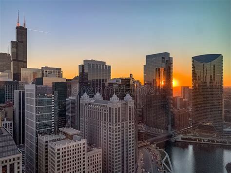 Aerial View Of Chicago Loop And Chicago River During Sunset Stock Photo