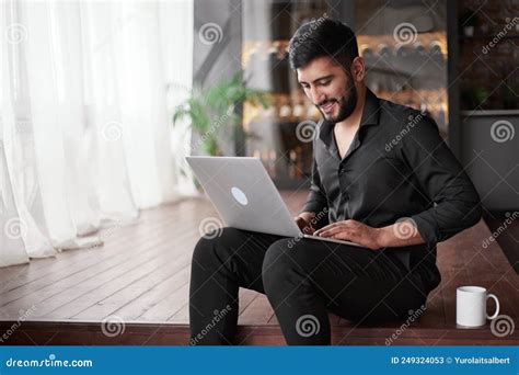 Business Owner Using A Laptop In His New Store Stock Image Image Of