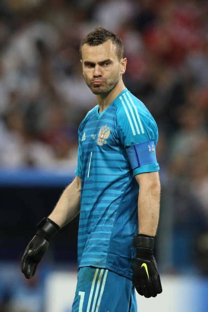 Igor Akinfeev Of Russia Looks Dejected After Conceding The Second Goal