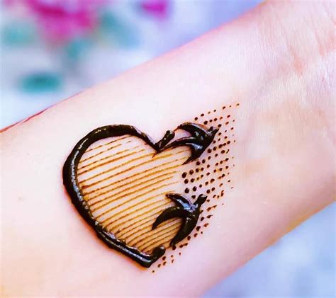 Small Henna Tattoo Designs For Hands And Wrist 11
