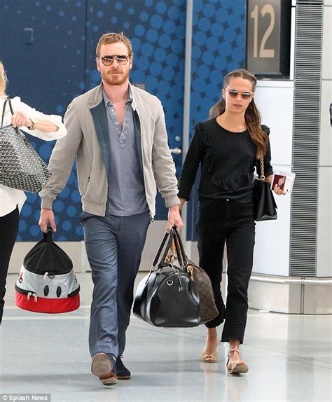 alicia vikander and michael fassbender at toronto airport daily mail online