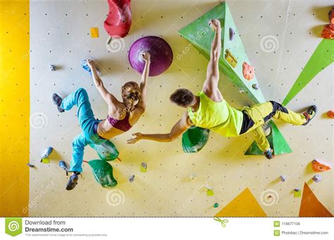 Rock Climbers In Climbing Gym Stock Photo Image Of Bouldering Grip