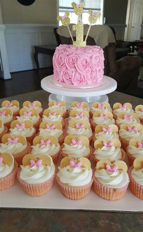Check out good housekeeping's sweet themes for every party! Minnie mouse cake and cupcakes pink and gold | Minnie ...