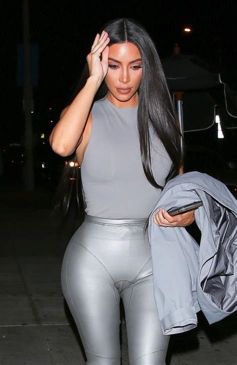 Kim Kardashian Wears Skin Tight Silver Outfit On Night Out With Sister Kourtney Daily Telegraph
