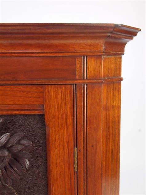 Small Victorian Sunflower Carved Corner Cabinet