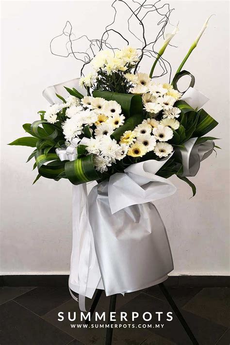 Our online delivery ensures that you sympathise best with the freshest of flowers in melbourne. During times of grieving, a graceful sympathy #flowerstand ...