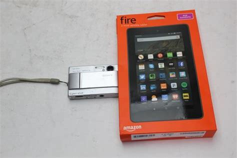 Amazon 7 Fire Tablet And Sony Cyber Shot Digital Camera Property Room