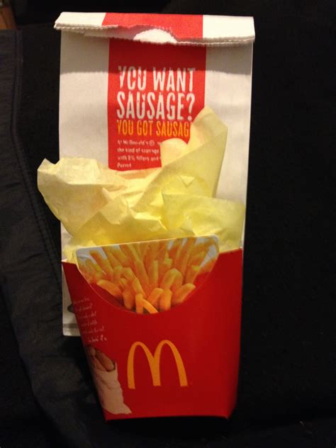 mcdonald s t card that i placed in a clean fry container with yellow tissue then i placed it