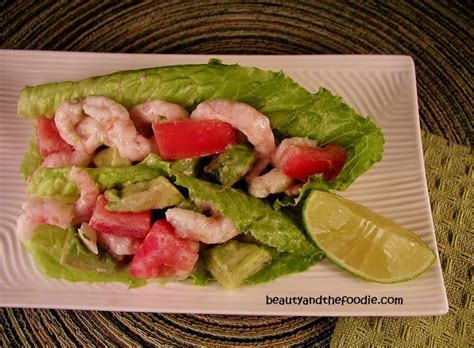 Cool and tasty shrimp ceviche recipe, shrimp served with chopped red onion, chile, cilantro, cucumber, avocado with lemon and lime juices. Coconut Lime Shrimp Ceviche - fastPaleo