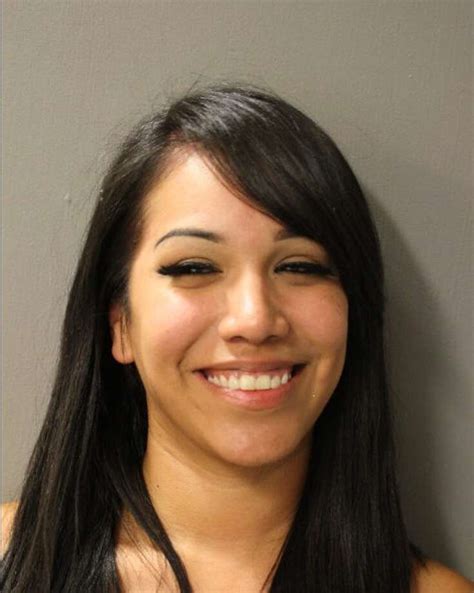 Woman All Smiles After Being Arrested For Fleeing Police Houston
