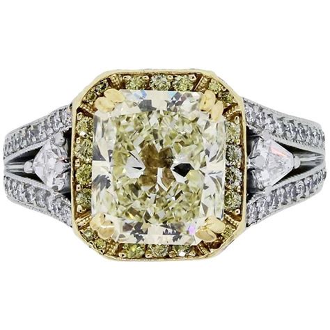 Yellow diamond engagement rings are unique and dazzling colorful alternatives to a classic white diamond engagement ring. Gregg Ruth 3.42 Carat Radiant Cut Light Fancy Yellow ...