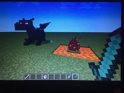 ender dragon and a fire dragon egg minecraft amino