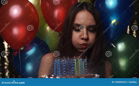 Birthday Woman Blowing Candles On Cake With Balloons At Party Stock Footage Video Of Candles