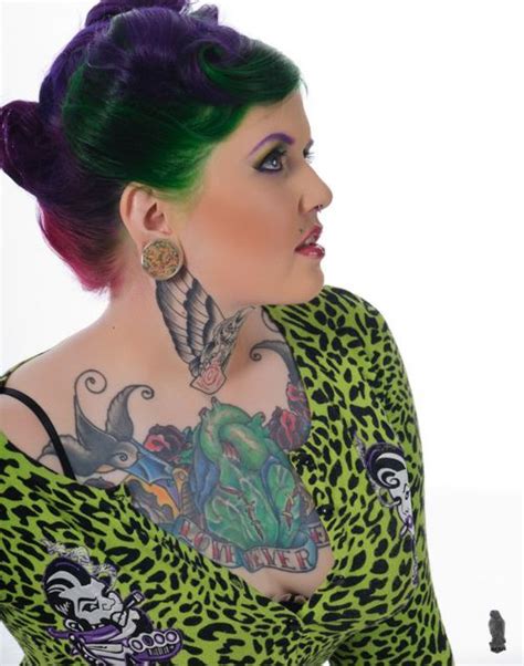 Retro Girl With Dyed Hair And Chest Tattoo