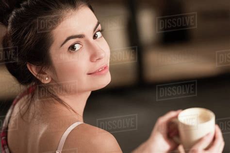 Selective Focus Of Beautiful Girl Drinking Coffee In The Morning Stock Photo Dissolve