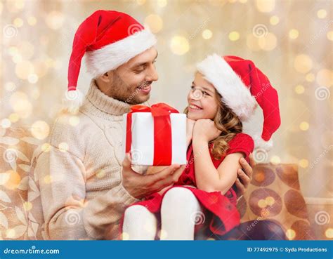 smiling father giving daughter t box stock image image of celebration little 77492975