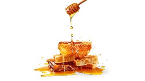 Premium Ai Image Honey Dripping From Wood Dipper Into A Honeycomb On