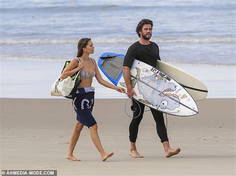 Chris And Liam Hemsworth Hit The Beach In Byron Bay With Bikini Clad Model Gabriella Brooks