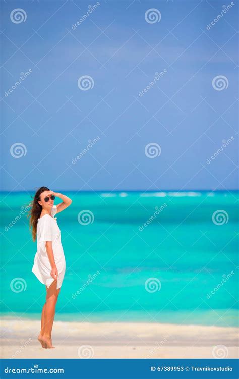 Young Beautiful Woman During Tropical Beach Vacation Stock Image
