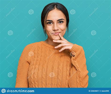 Young Brunette Woman Wearing Casual Winter Sweater Looking Confident At