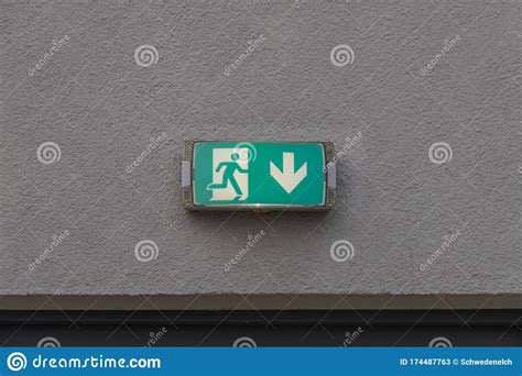 Sign For Emergency Exit On A Wall Stock Image Image Of