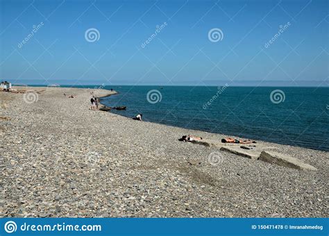 Beach Goers Sunbathe And Relax At Rocky Black Sea Shore Coastline Batumi Georgia Editorial Stock