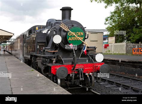 Steam Engine With Pullman Cars Waiting At Sheffield Park Station On The
