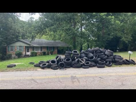 Atlanta woman trapped in driveway after man dump nearly 100 tires in