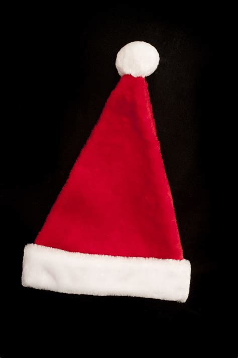 Free Stock Photo 10568 Red And White Christmas Hat On Black Background