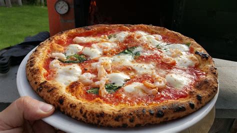 Here, wood oven pizza is made with old world tradition for modern tastes. Pro/Chef Wood-Fired Margherita Pizza : food