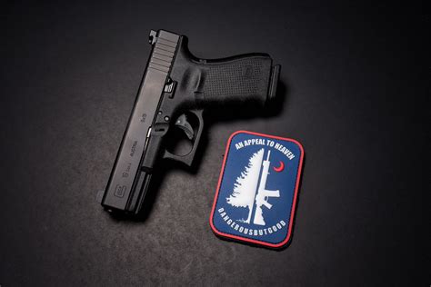 Free Download Hd Wallpaper Macro Gun Background Glock 19