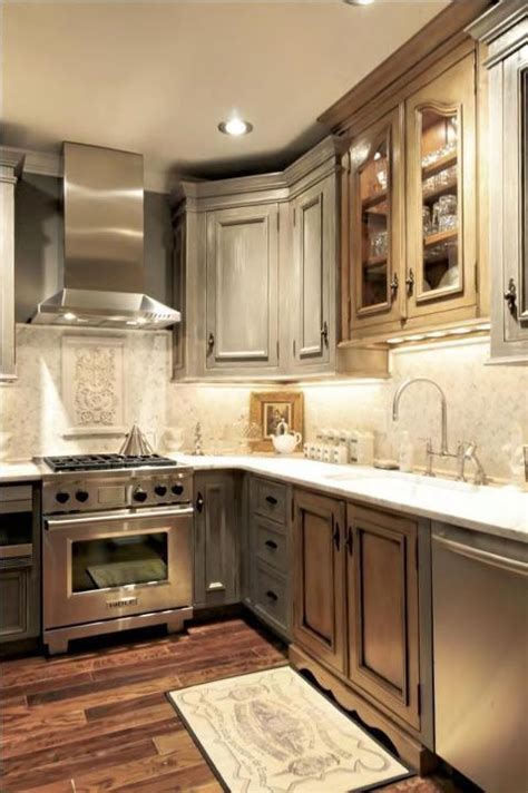gray stained cabinets~ I have a hard time painting wood so maybe stain them gray so grain is ...