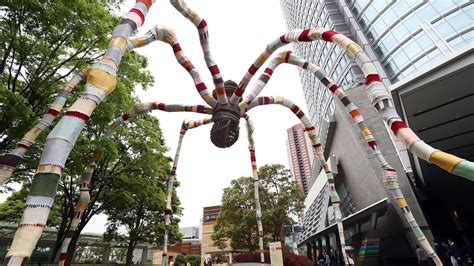 Giant Spider Sculpture Dressed In Colorful Sweater Cgtn
