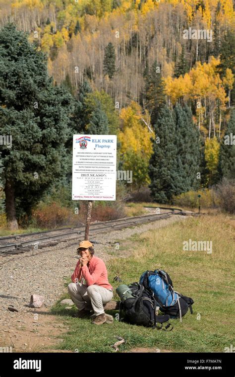 Backpacker Waiting For The Durango And Silverton Narrow Gauge Railroad