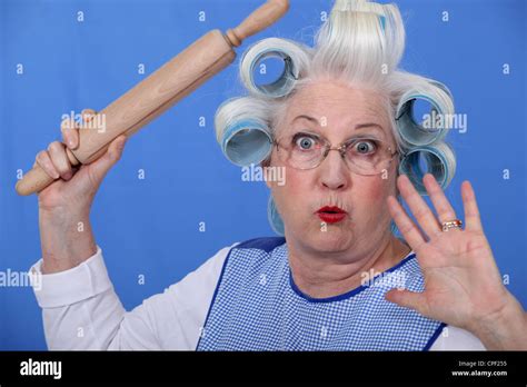 Scared Old Lady With Hair Rollers Stock Photo Alamy