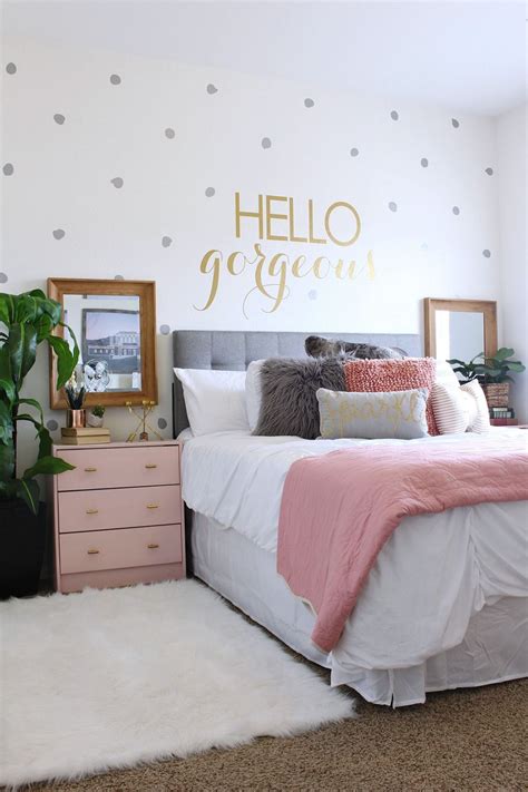 Soft, pastel wall colors paired with a brighter floral bedspread and decorations make a room that's feminine, but not overpowering. How To Set Bedroom Ideas for Women