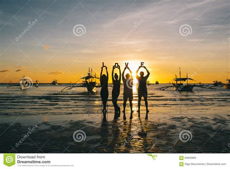 Couples In Love Happy At Romantic Beach Sunset Stock Image
