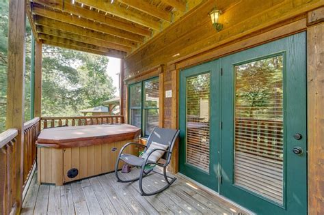 Each cabin will accommodate one additional person on a cot for $15 per stay. Charming cabin w/ a private hot tub, gazebo, game room ...