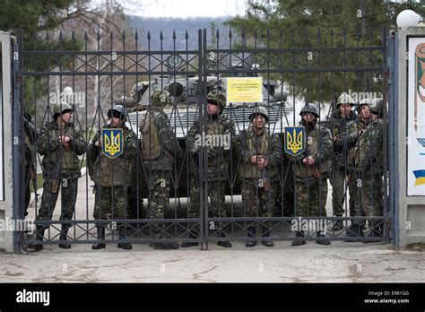 Ukrainian Soldiers Inside The Gate Of The Perevalne Military Base Near