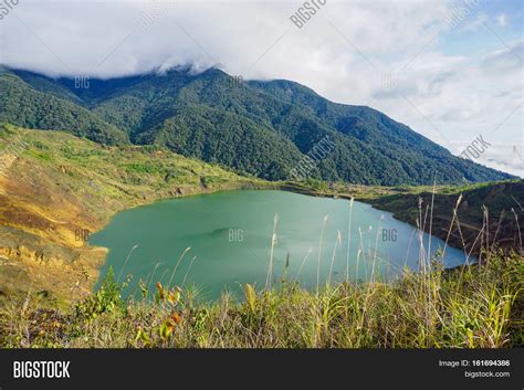 In malaysia, an open pit copper mine is iocated in the headwater of the mamut river in the interior a study of the mamut rjver by lee and stuebing (1990) on the effect of copper mine runoffidischarge. Beautiful Lake Mamut Copper Mine, Image & Photo | Bigstock