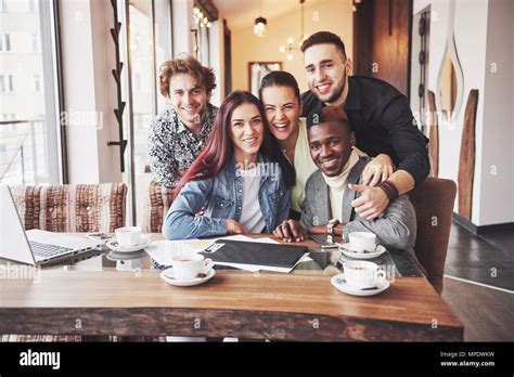 Multiracial People Having Fun At Cafe Taking A Selfie With Mobile Phone Group Of Young Friends