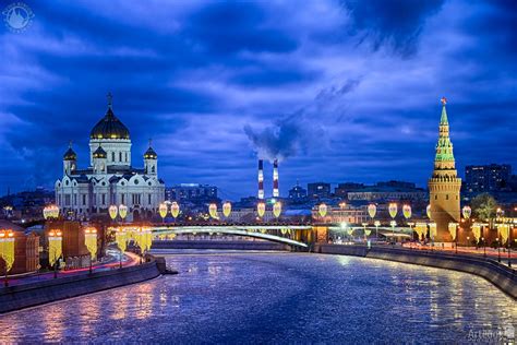 Winterscape Of Icy Moskva River And Moscow Landmarks In Blue Hour