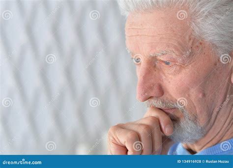 Close Up Portrait Of Thoughtful Senior Man Stock Photo Image Of Adult