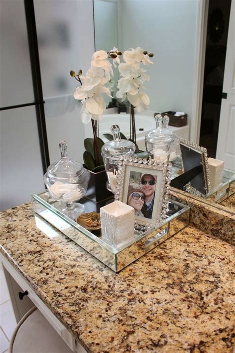 But apart from creativity, it is the bathroom's function that needs to be given more emphasis first. Decorating your bathroom with crystal pots - becoration