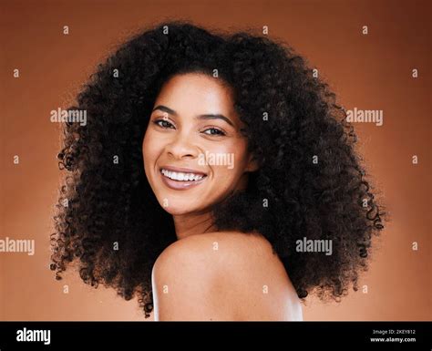 Black Woman Afro Beauty And Smile For Skincare Makeup Or Cosmetics Against A Studio Background